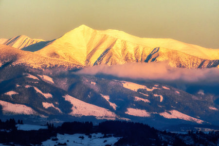 Colorful top of the hill Baranec during evening light