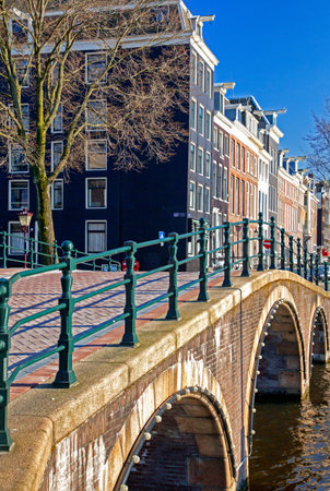 AMSTERDAM, NETHERLANDS - MARCH 26, 2013: Typical architecture in AMsterdam cityのeditorial素材