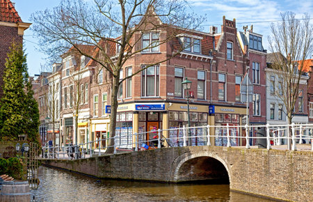 DELFT, NETHERLANDS - MARCH 25, 2013: Water canals in centre of cityのeditorial素材