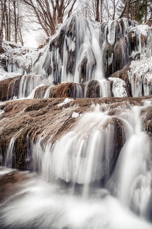 Blurred water in waterfall at village Lucky, Slovakiaの写真素材