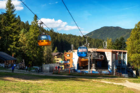 RUZOMBEROK, SLOVAKIA - OCTOBER 2, 2021: Gondolas in front of station of cableway in resort Malino Brdo ski and bike parkのeditorial素材