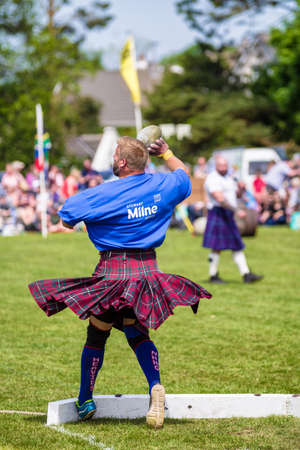 CARMUNNOCK, SCOTLAND - MAY 27: Stone put discipline at Carmunnock International Highland Games on May 27, 2018 in Carmunnockのeditorial素材
