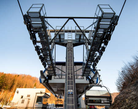 BANSKA STIAVNICA, SLOVAKIA - FEBRUARY 27, 2022: Bottom station of ski-lift chair at Salamandra resort in winter season.のeditorial素材