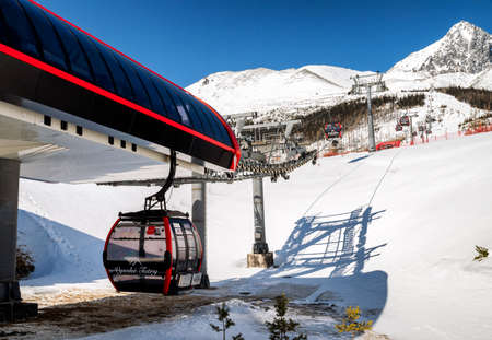 TATRANSKA LOMNICA, SLOVAKIA - MARCH 12, 2022: Station of cableway in resort Tatranska Lomnica in High Tatras mountains, Slovakiaのeditorial素材