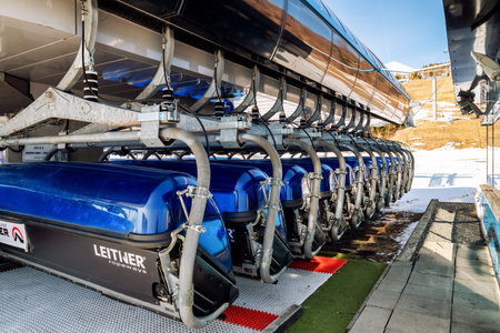 TATRANSKA LOMNICA, SLOVAKIA - MARCH 12, 2022: Blue ski lift chair in resort Tatranska Lomnica in High Tatras mountainsのeditorial素材