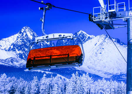 TATRANSKA LOMNICA, SLOVAKIA - FEBRUARY 22, 2011: Ropeway in resort Tatranska Lomnica in High Tatras mountains, Slovakiaのeditorial素材