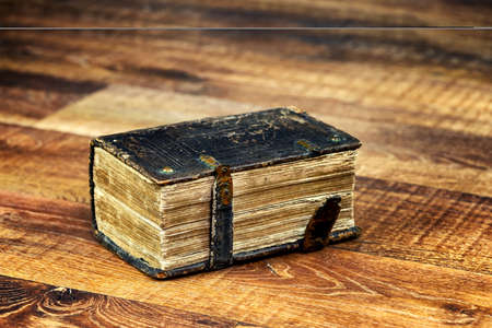 Old ancient leather big bookの写真素材