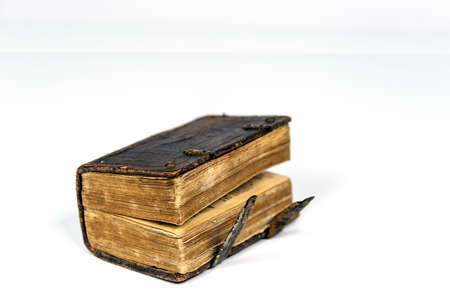 Big thick open book on white background.の写真素材