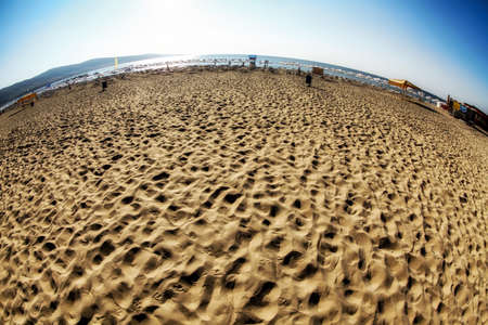 Sandy beach, sea and sunny day at Sunny beach in Bulgariaの写真素材