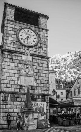 KOTOR, MONTENEGRO - AUGUST 13, 2010: Tower of church in historic town Kotor in  Montenegro