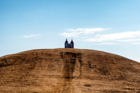 BANSKA STIAVNICA, SLOVAKIA - FEBRUARY 27, 2022: Church in historic calvary at town Banska Å tiavnicaのeditorial素材
