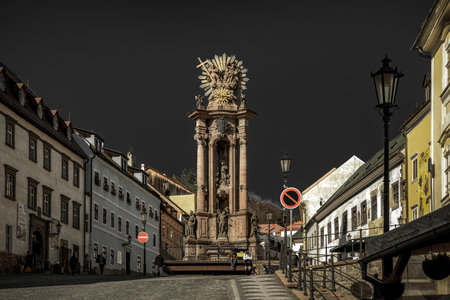 BANSKA STIAVNICA, SLOVAKIA - FEBRUARY 27, 2022: Plaque column in historic centre of town Banska Stiavnica in Slovakiaのeditorial素材