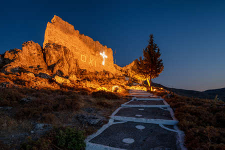 Ruins of Archangelos fort castle in Rhodes island, Greece. View on villageの写真素材