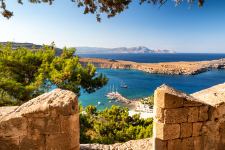LINDOS, GREECE - JULY 1, 2022: View on Rhodes island from Lindos acropolisのeditorial素材