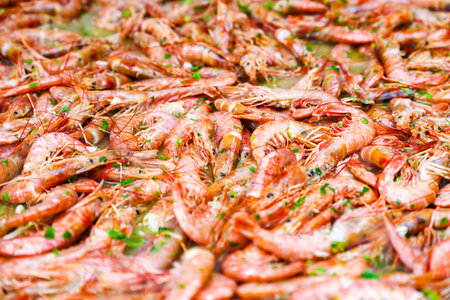 Spanish paella prepared in the street restaurant.の写真素材