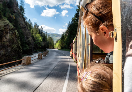 Tourists looking from train for tourist in village Terchova, Slovakia.の写真素材
