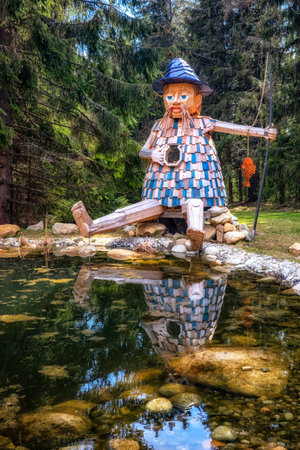 Pribylina, Slovakia - April 22, 2023: Wooden statue in Rackova valley in Western Tatras in Slovakiaのeditorial素材