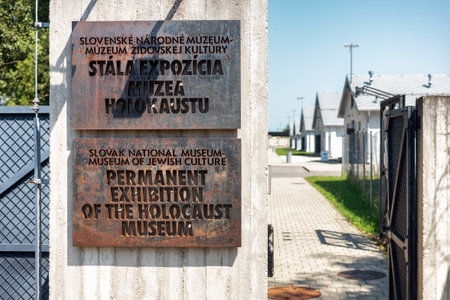 Sered, Slovakia - September 10, 2025: Entrance sign of the Holocaust Museum at the Slovak National Museum of Jewish Culture, showing the permanent exhibition plaque at the site.のeditorial素材