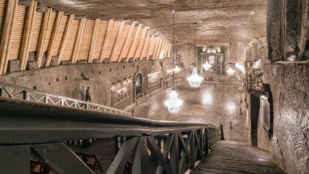 Wieliczka, Poland - February 20: Underground chamber with large chandeliers carved from salt rock...