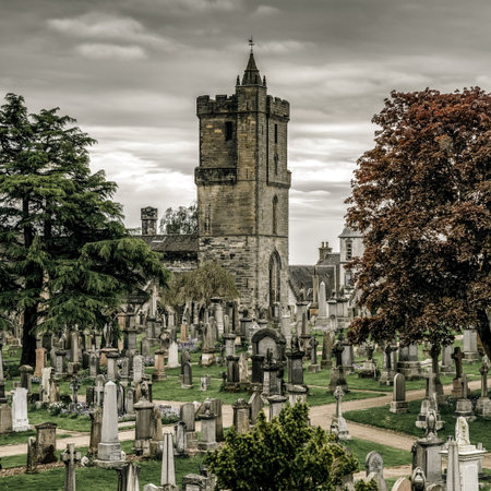 Stirling, Scotland â May 20, 2018: Historic Stirling cemetery with rows of gravestones and a medieval stone tower near the Church of the Holy Rude, illustrating centuries of burial tradition in the heart of this Scottish city.のeditorial素材