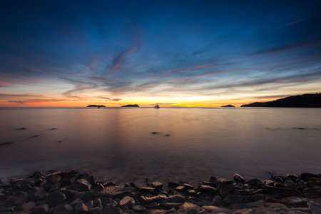 The sunset on the beachの写真素材