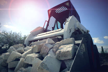 a skid steer ready for hard workの写真素材