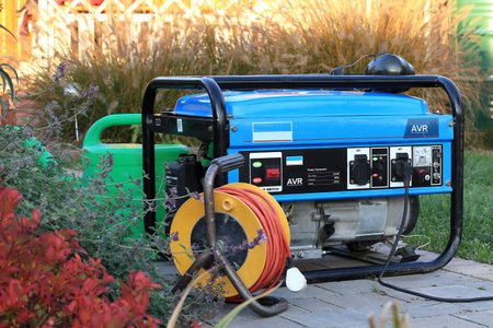 power generator standing in the garden.の写真素材