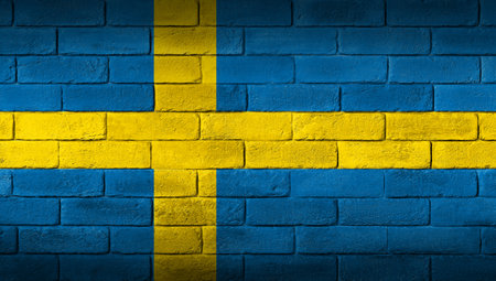 Swedish flag painted on a brick wallの写真素材