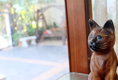 wooden catの写真素材