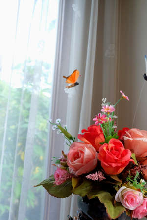 fake flowers in vaseの写真素材