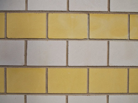 Yellow And White Brick Wall