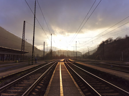 Beautiful sunset at empty countryside train station.