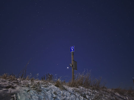 Venus sign and the actual planet on the night sky. Astronomical background.の写真素材
