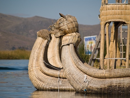 Floating Uros Island boats on Lake Titicaca in Peruの写真素材