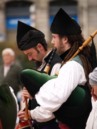 OVIEDO, SPAIN - NOVEMBER 6: Bagpipes Bands play every weekend for tourist in Oviedo, on November 6th, 2010 in Asturias, Spainのeditorial素材