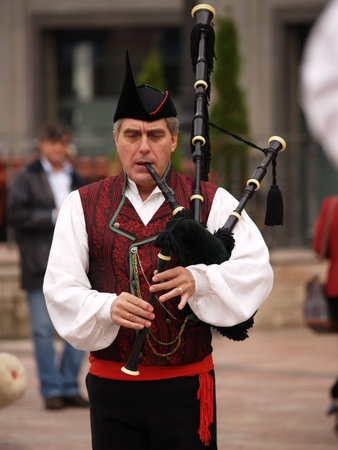 OVIEDO, SPAIN - NOVEMBER 6: Bagpipes Bands play every weekend for tourist in Oviedo, on November...