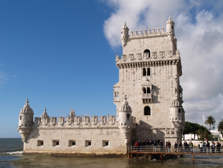 LISBON - DECEMBER 31: Tourist enjoy visiting the Belem Tower (Torre de Belem), a symbol of Lisbon, listed in UNESCO World Heritage Site, on December 31, 2010 in Lisbon, Portugalのeditorial素材