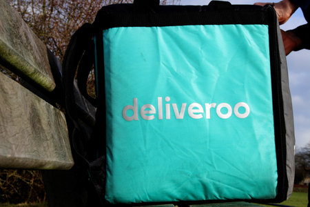 Utrecht, the Netherlands, February 19, 2019: Deliveroo person, waiting for the next orderのeditorial素材