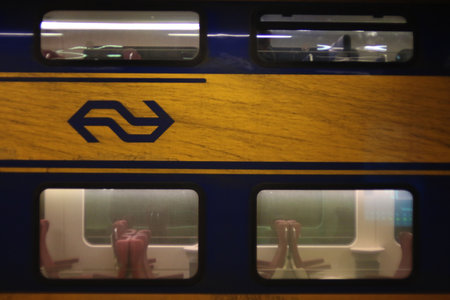 Utrecht, the Netherlands, February 15, 2019: An view of a dirty train from an empty intercity of the NSのeditorial素材