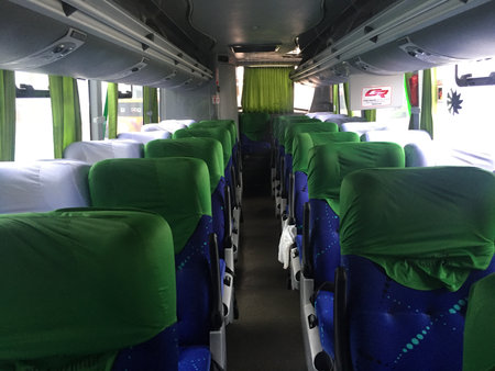 Manta, Ecuador, 10-9-2019: The inside of bus in ecuador showing the many seatsのeditorial素材