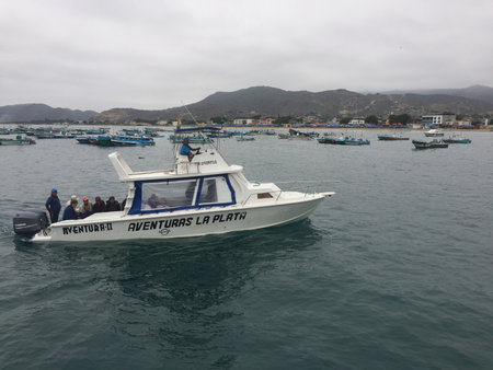 Puerto Lopez, Ecuador, 9-7-2019: A whale watching boat with tourists returning from watching whalesのeditorial素材