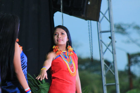 Puyo, Ecuador, 17-8-2019: An indigenous tribe called shuar performing their dance in traditional clothing and spearsのeditorial素材