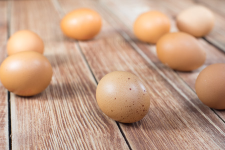 Hen Eggs free deploy on the Wooden Tableの写真素材