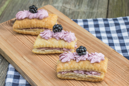Puff pastry tasty with blackberry-mascarpone creamの写真素材