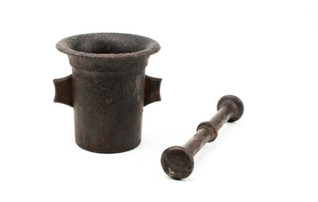 Rusted authentic ancient mortar isolated on a white backgroundの写真素材