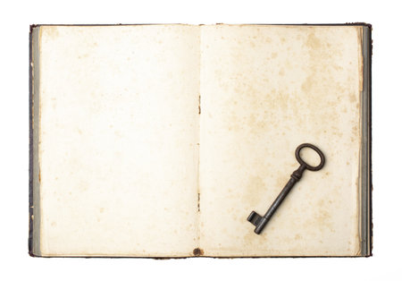 Antique key on an old book.の写真素材