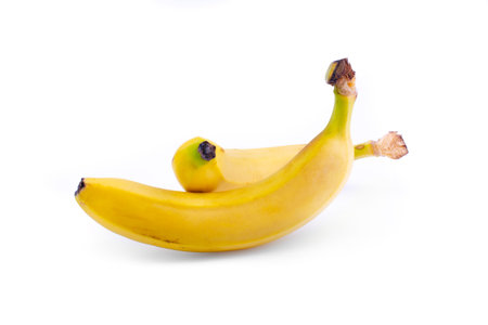 Two bananas isolated on a white background.の写真素材