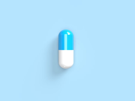 Pill on a blue background. Antibiotics. 3D render.の写真素材
