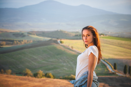 Smiling beautiful woman on vacation in Tuscany, Italy.の写真素材