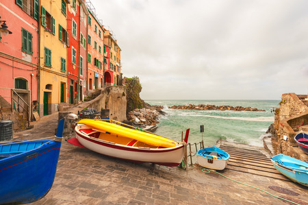 Fishing boats in the coastal town of Riomaggiore in the Cinque Terre National Park, Italy.の写真素材